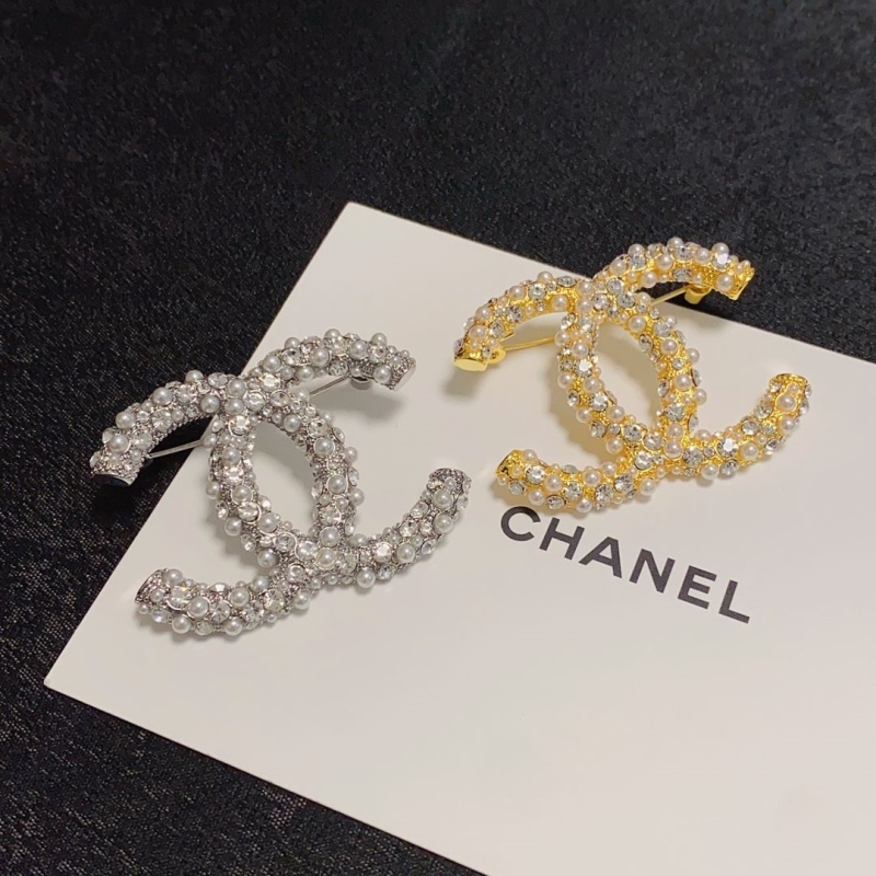 Ch**el brooches